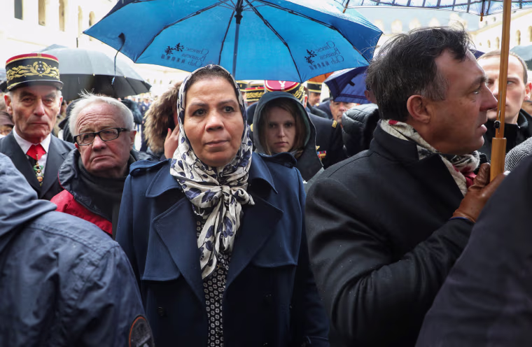 Image: Latifa Ibn Ziaten, French-Moroccan president of the Imad Ibn Ziaten Youth Association for Peace, attends a national ceremony in Paris
