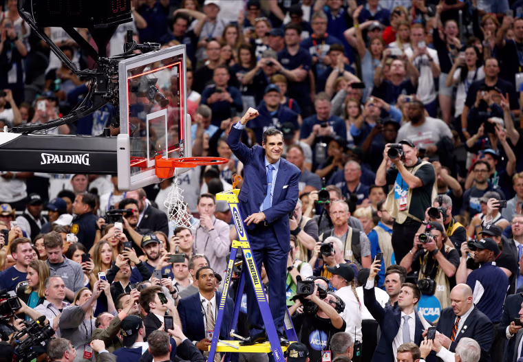 Villanova head coach Jay Wright cheers as he cut down the net after beating Michigan 79-62 in the championship game of the Final Four NCAA college basketball tournament in San Antonio on April 2. This is the second NCAA national championship in three years for Villanova, making the team the only fourth program since UCLA to win two titles in the span of three years -- joining Duke, Kentucky and Florida.