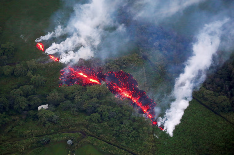 Image: Lava erupts from a fissure east of the Leilani Estates subdivision during ongoing eruptions of the Kilauea volcano