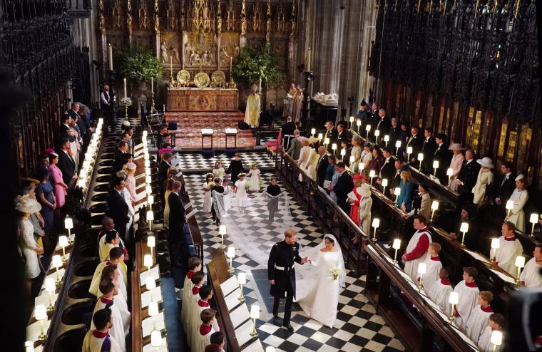 Image: Prince Harry, Duke of Sussex and the Duchess of Sussex leave following their wedding ceremony