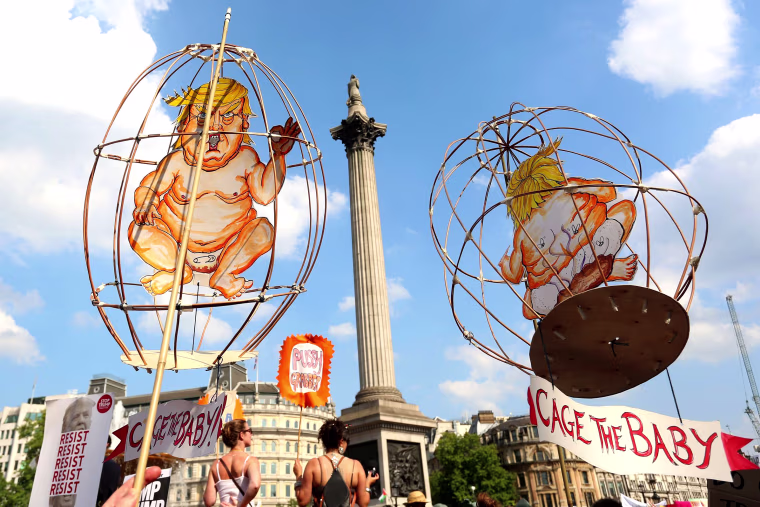 Image: Trump babies in cages are held up in Trafalgar Square