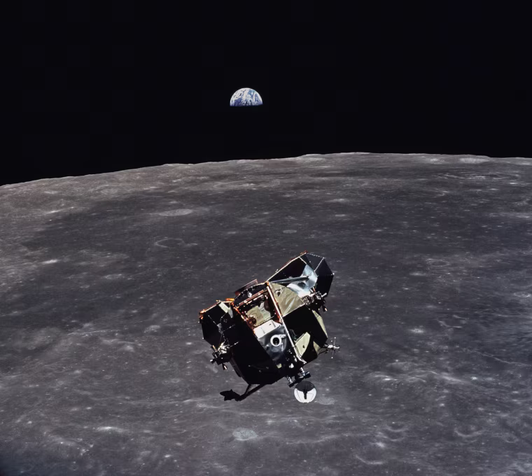 Image: Image: The Apollo 11 Lunar Module ascent stage, with astronauts Neil A. Armstrong and Edwin E. Aldrin Jr. aboard, is photographed from the Command and Service Modules (CSM) during rendezvous in lunar orbit