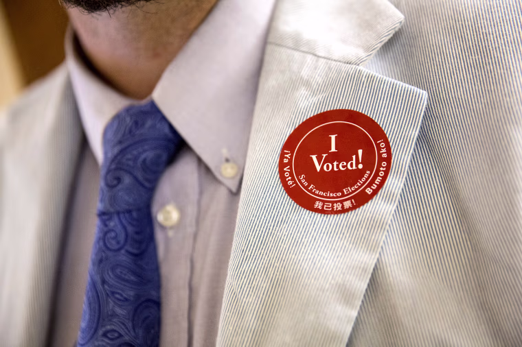 Image: A man wears a "I Voted!" sticker after voting in the California primary on June 7, 2016 at City Hall in San Francisco.