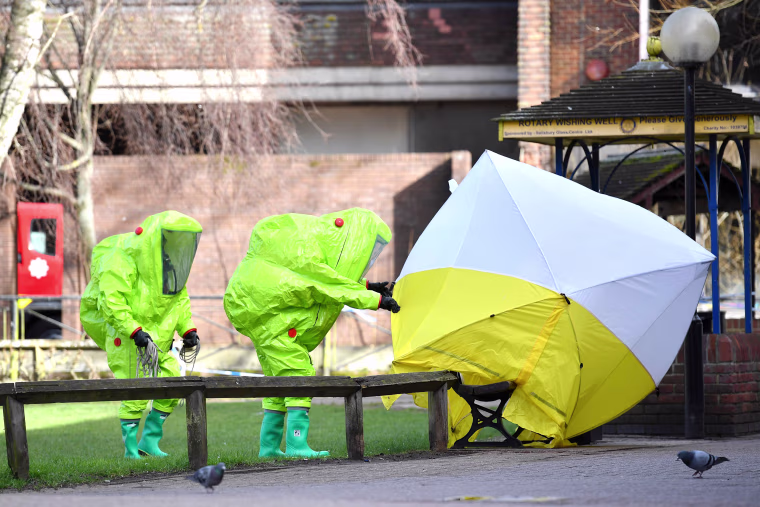 Image: Emergency officials work at the scene of an investigation in Salisbury