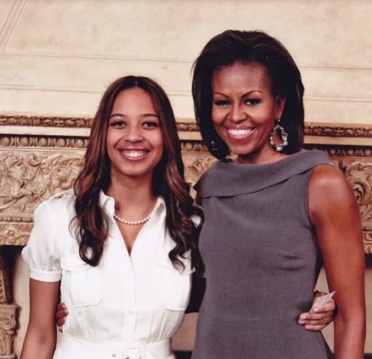 Lyric McHenry with former first lady Michelle Obama.