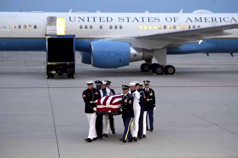 Image: Members of the military carry the flag-draped casket of the late US Senator John McCain