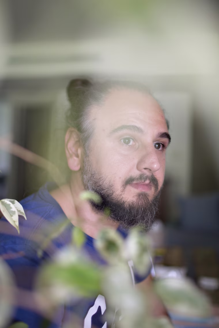 Image: Tunca Öğreten, a Turkish journalist who spent one year in jail without trial, at home in Istanbul