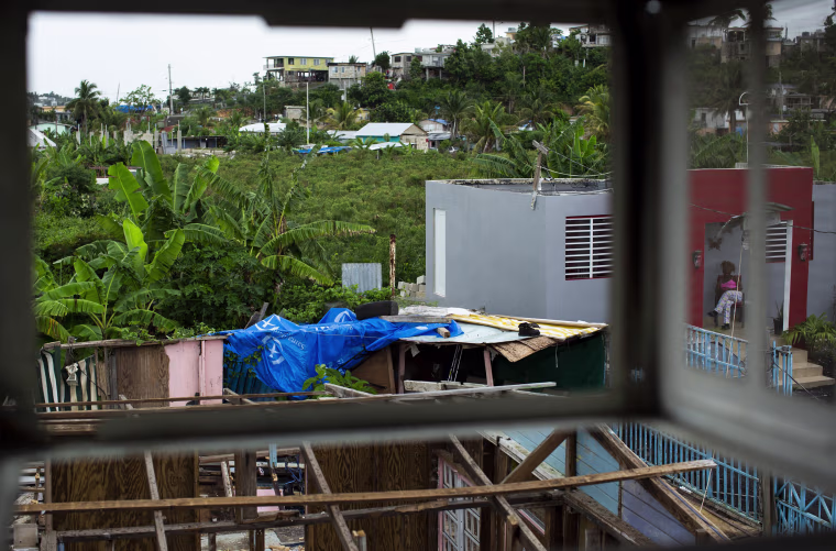 Image: View from the air-conditioning hole in at the room of Ramon Paez-Marte and Sol D. Reyes Perez's home at Valle Hill