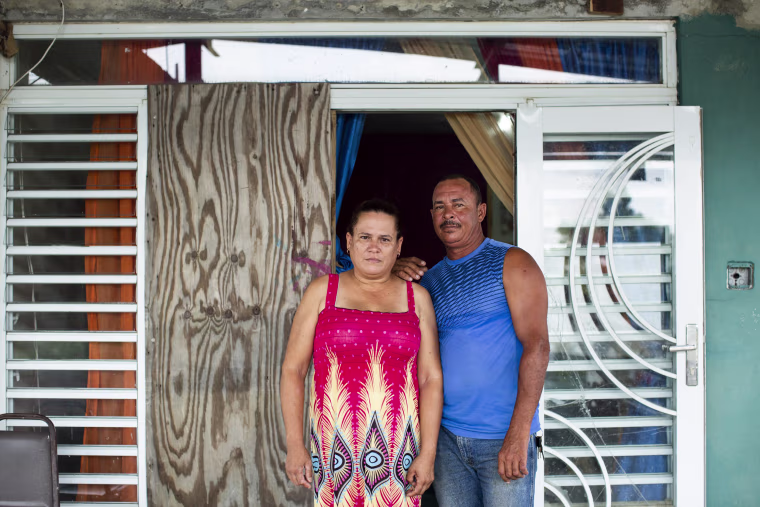 Image: Ramón A. Paez Marte and Sol D. Reyes Perez in their home