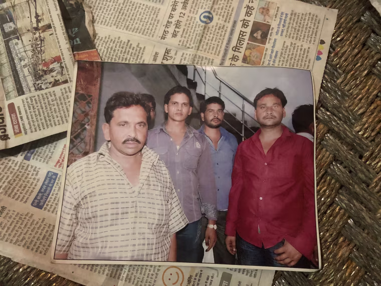 Image: A family photograph of Qasim Qureshi (L) and relatives