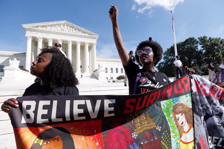 Image: Activists hold a protest march and rally in opposition to U.S. Supreme Court nominee Brett Kavanaugh in Washington
