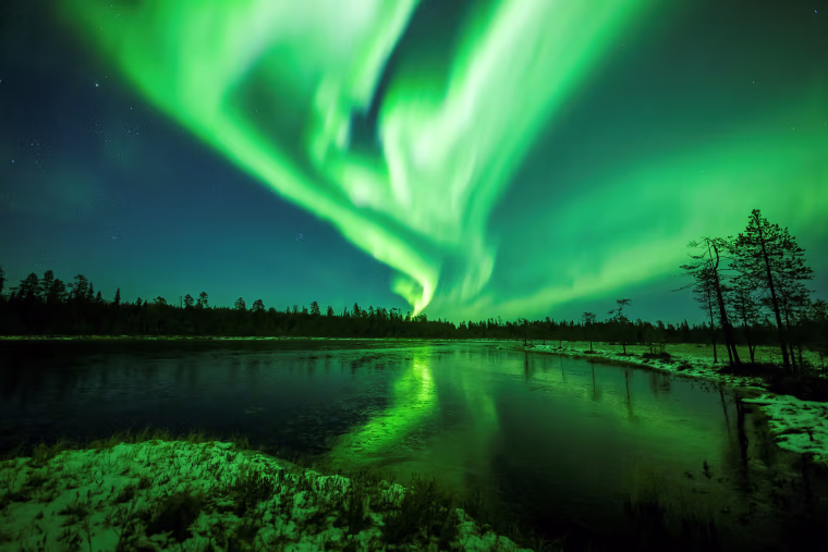 The Aurora Borealis (Northern Lights) is seen over the sky near Rovaniemi in Lapland, Finland, Oct. 7, 2018.