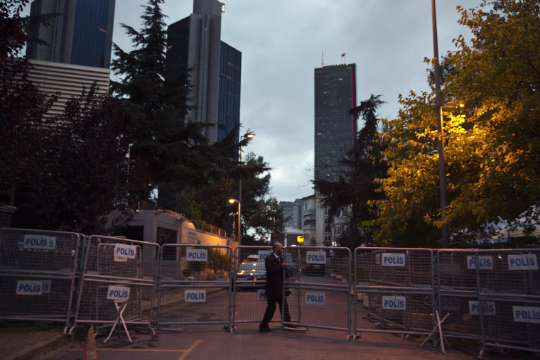 Image: A metal security barrier stands in front of the Saudi Arabia's consulate 