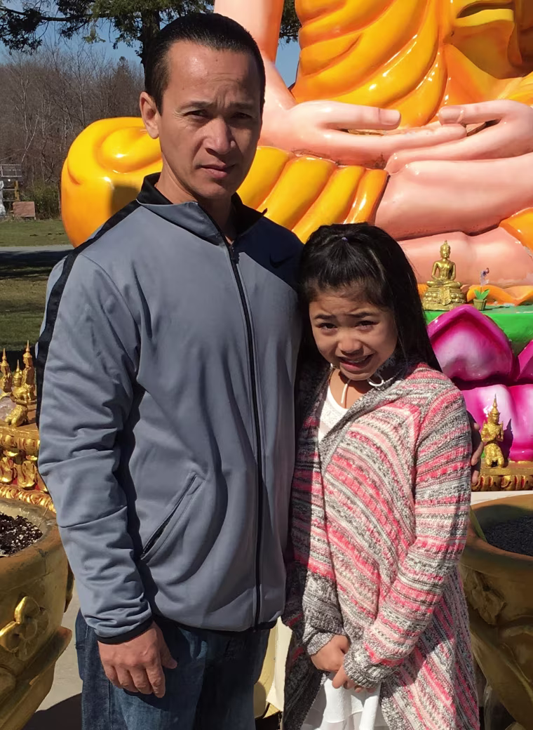 Sene Sem and his daughter.