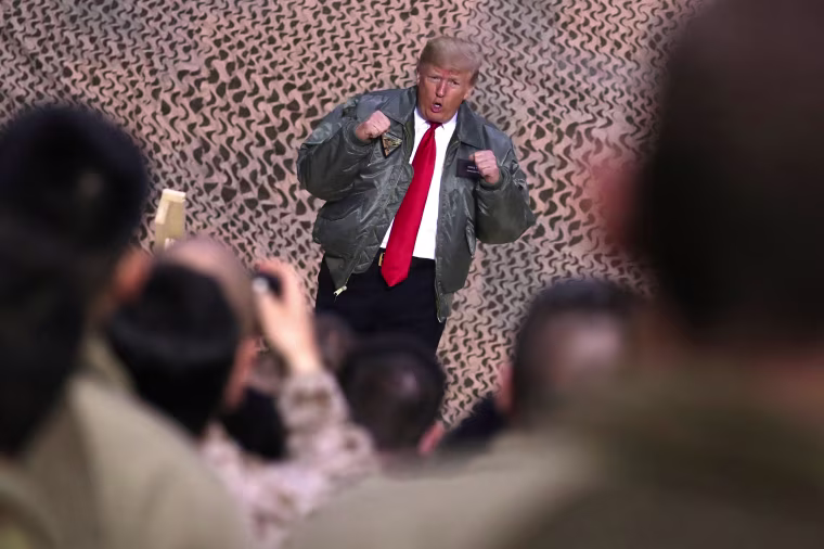 Image: President Donald Trump greets U.S. troops during an unannounced visit to Al Asad Air Base in Iraq.