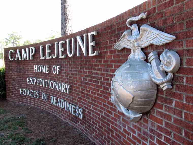 Image: The globe and anchor stand at the entrance to Camp Lejeune, N.C