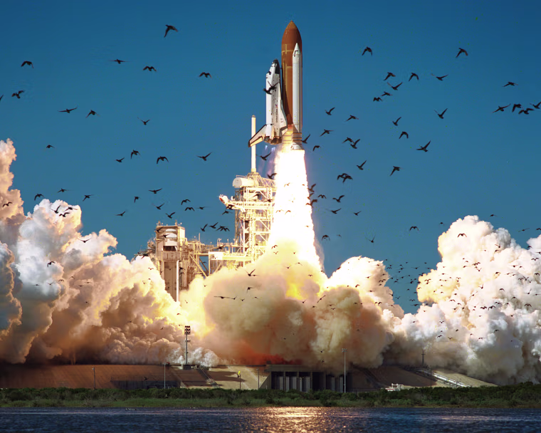 Image: A wide-angle view shows the ascent of the shuttle Challenger