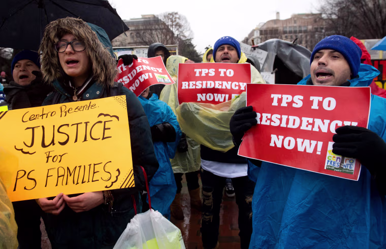 Image: Demonstrators walk in the March for TPS Justice in Washington on Feb. 12, 2019.