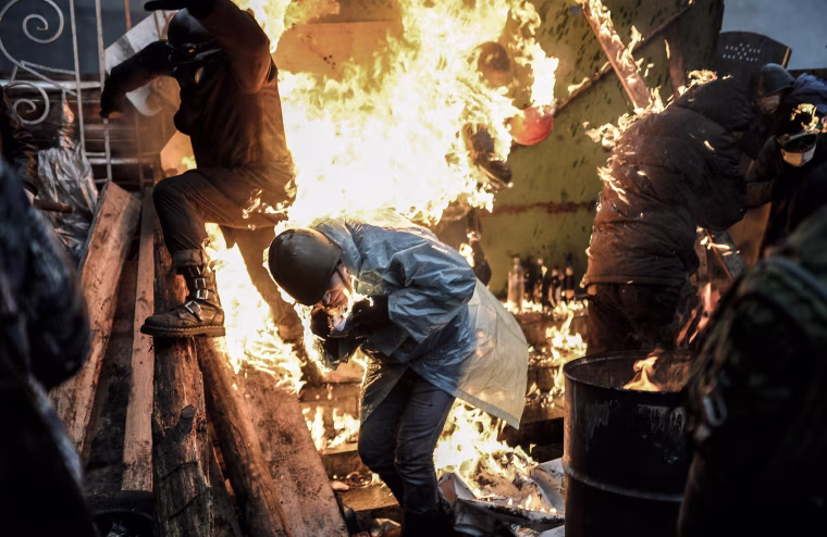 Image: Protesters during clashes with police in Kiev in 2014