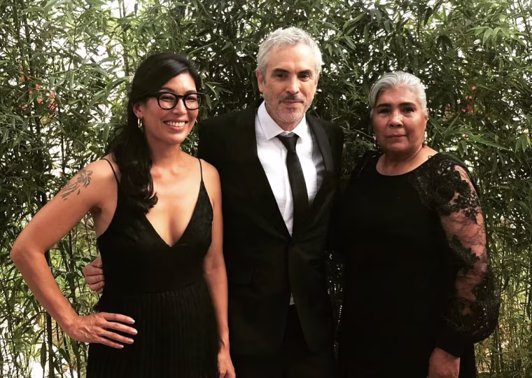 Image: Ai-jen Poo, director of the National Domestic Workers Alliance (NWDA), with "Roma" director Alfonso Cuaron and NWDA member Rosa Sanluis.