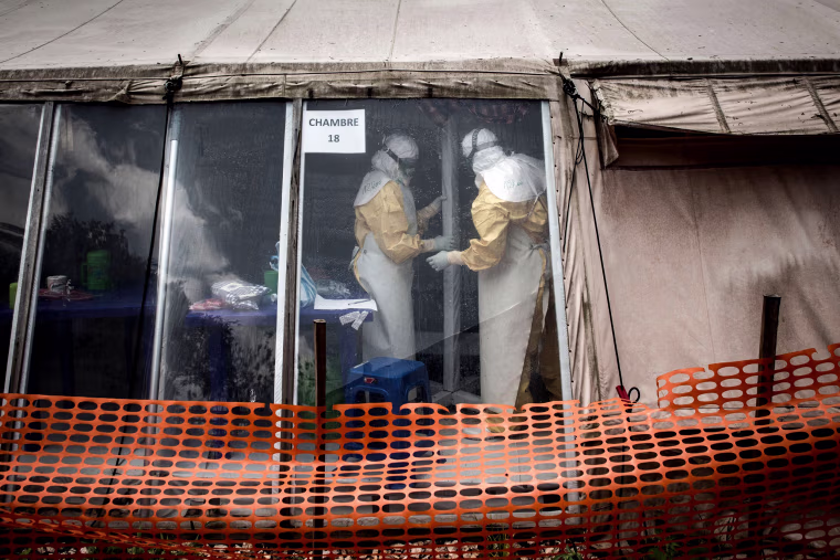 Image: Health workers inside the "red zone" of an Ebola treatment center in the Democratic Republic of Congo