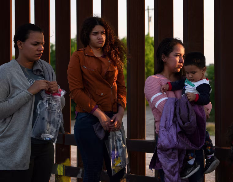 Image: Central American migrants turn themselves in to U.S. Border Patrol as they seek asylum after illegally crossing the Rio Grande near Penitas