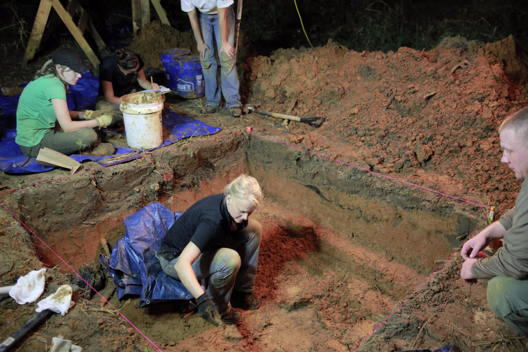 Dr. Erin Kimmerle exhumes a grave at the Boot Hill cemetery at the now closed Arthur G. Dozier School for Boys in Marianna