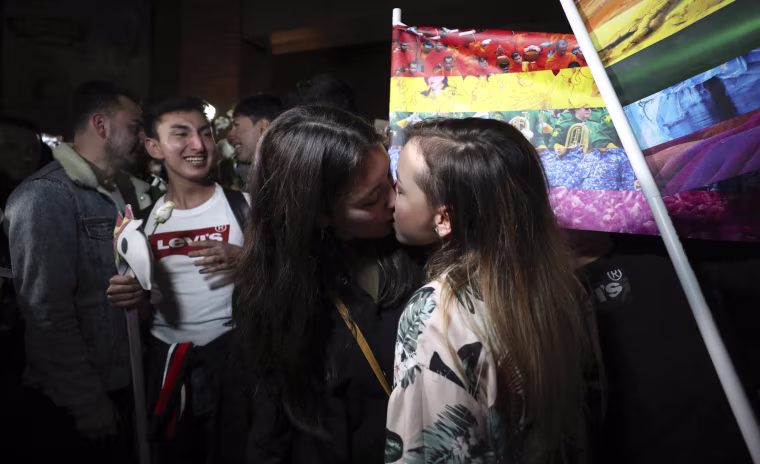 Image: Couples attend a "kiss-a-thon" to advocate for LGBT rights in Bogota, Colombia, on April 17, 2019.
