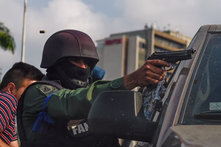Image: TOPSHOT-VENEZUELA-CRISIS-CLASHES
