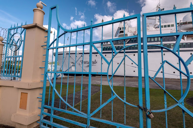 Image: The Freewinds cruise ship owned by the Church of Scientology is seen docked in quarantine at the Point Seraphine terminal in Castries, Saint Lucia