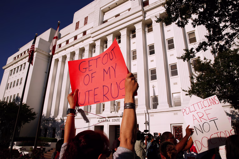 Image: Pro-choice supporters protest in front of the Alabama State House as Alabama state Senate votes on the strictest anti-abortion bill in the United States at the Alabama Legislature in Montgomery