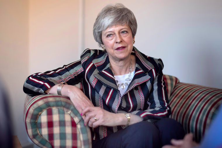 Image: Britain's Prime Minister Theresa May visits a charity providing support for victims of domestic violence in west London