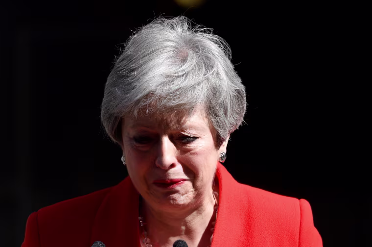 Image: British Prime Minister Theresa May reacts as she delivers a statement in London