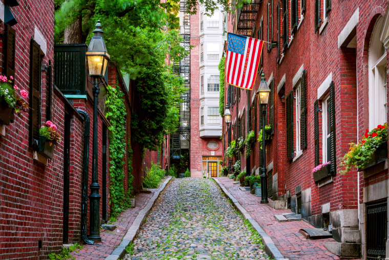 Image: Brick houses along Acorn Street in the Beacon Hill section of Boston.