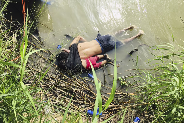The bodies of Salvadoran migrant Oscar Alberto Martinez Ramirez and his nearly 2-year-old daughter Valeria lie on the bank of the Rio Grande in Matamoros, Mexico on June 24.