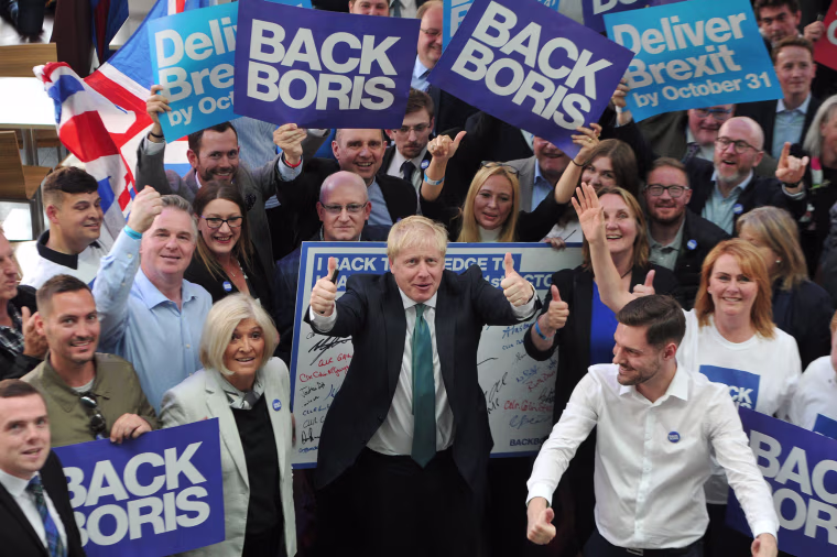 Image: Boris Johnson poses with supporters before a Conservative Party event in Perth, Scotland, on July 5.
