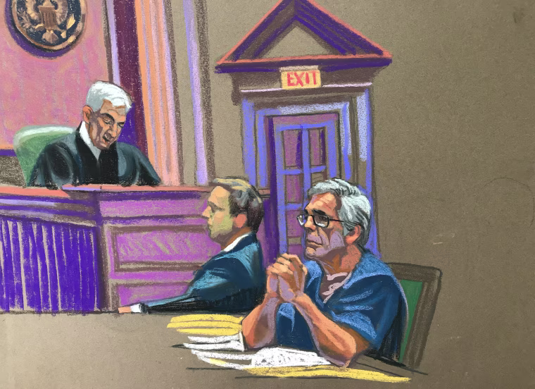 U.S. financier Jeffrey Epstein looks on near Judge Richard Berman during a bail hearing in his sex trafficking case in New York on July 18, 2019.