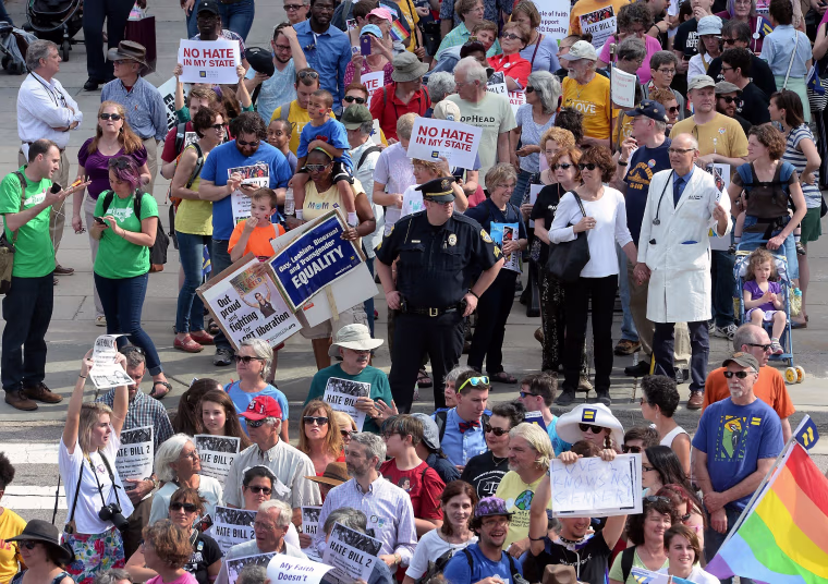Image: Protesters prepare for a sit-in against House Bill 2, a Republican-backed law curtailing protections for LGBT people and limiting public bathroom access for transgender people, in Raleigh, North Carolina, on April 25, 2016.