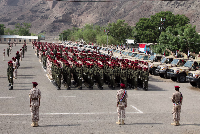 Image: Newly recruited troopers take part in a graduation parade in Aden, Yemen