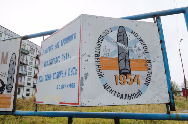 Image: A view shows a board on a street of the military garrison located near the village of Nyonoksa in Arkhangelsk Region