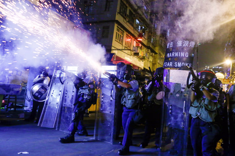 Image: FILE PHOTO: Police fire tear gas at anti-extradition bill protesters during clashes in Sham Shui Po in Hong Kong