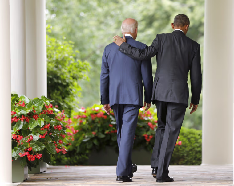 Image: President Obama and Vice President Biden walk to the Oval Office