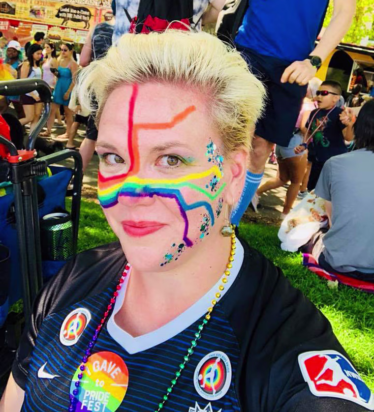 Jessica Strong wearing a Tacoma Reign FC jersey at Seattle Pride in 2018.