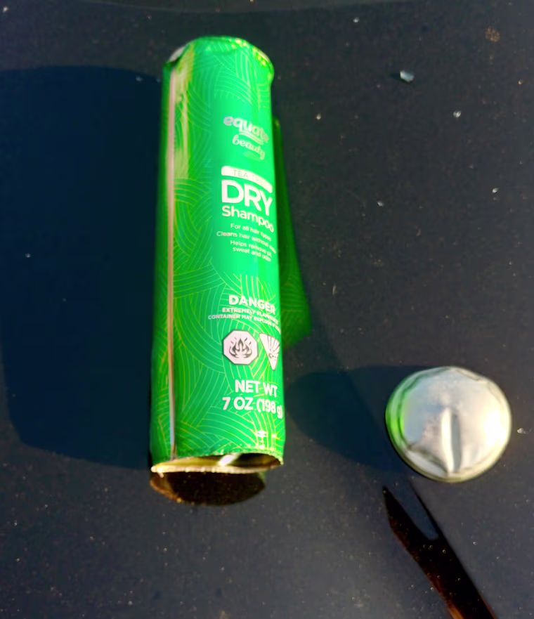 Image: Christine Bader Debrecht says a bottle of dry shampoo exploded through her cars sunroof.