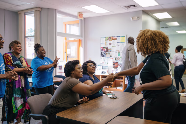 LaTosha Brown meets with community activists in Flint.