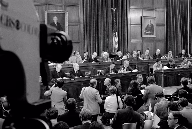 Image: Chairman of the House Judiciary Committee Peter Rodino reads his opening statement during an impeachment hearing against President Richard Nixon on May 9, 1974.