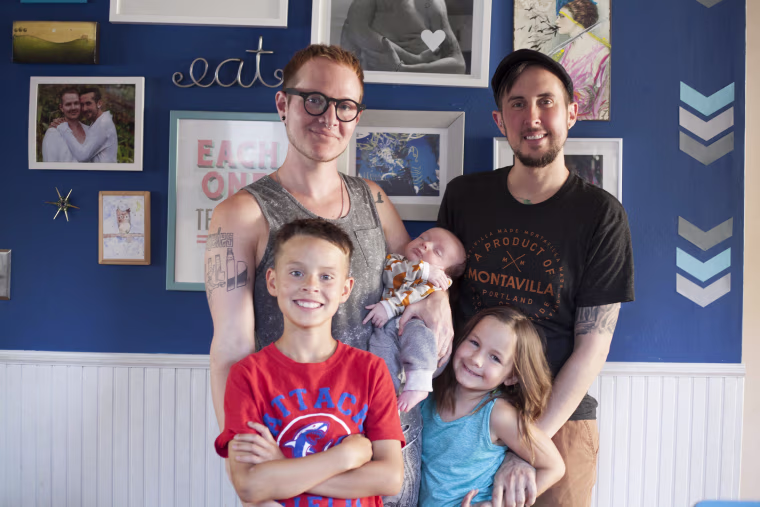 Trystan Reese, right, and Biff Chaplow with their children, from left, Riley, Leo and Hailey.