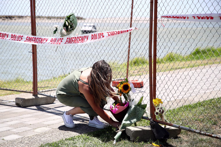 Image: Floral tributes are placed on a fence at the Whakatane Wharf on Dec. 10, 2019 in Whakatane, New Zealand.