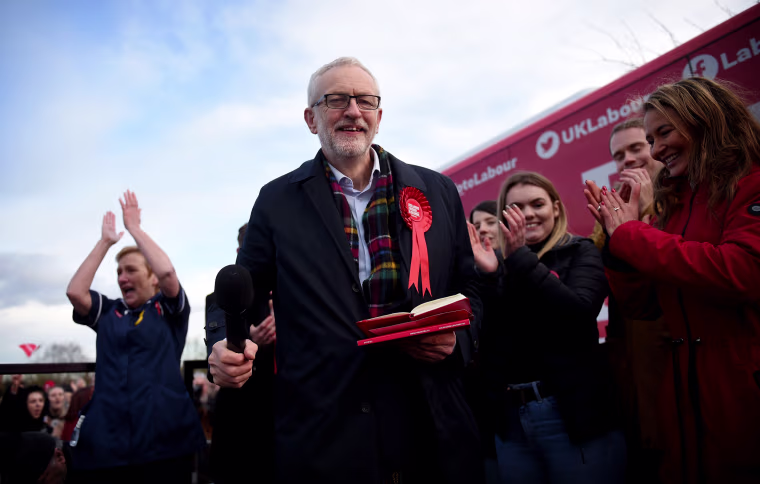 Image: Labour Party leader Jeremy Corbyn acknowledges applause during a campaign event in Stainton Village on Dec. 11, 2019.