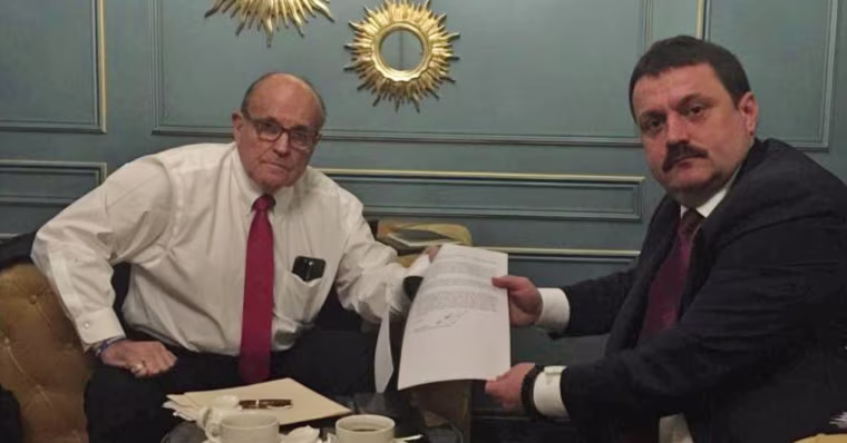 Image: Ukrainian lawmaker Derkach attends a meeting with U.S. lawyer Giuliani in Kiev